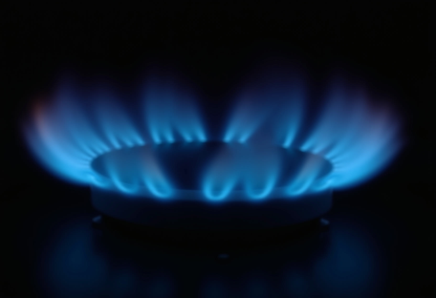 Clean blue flame across four burners